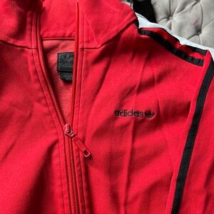 Adidas’s original zip up rapper track shirt